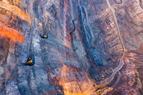 Preview: Aerial view of an open pit of iron ore. Resource mining