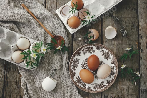 Preview: Happy Easter! Easter rustic still life. Easter eggs, spring flowers, burlap and spoon flat lay