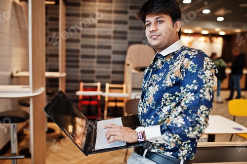 Preview: Indian man at fast food cafe
