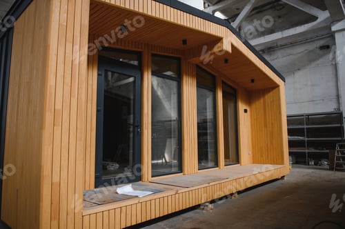 Preview: A new wooden modular prefabricated house inside in manufacturing facility