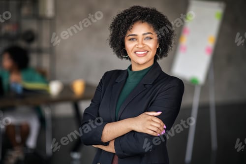 Preview: Portrait Of Happy Black Businesswoman Smiling Standing At Modern Office