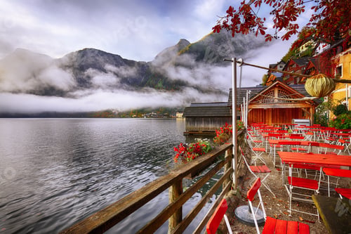Preview: famous Hallstatter lake. Foggy autumn sunrise at Small chinese restaurant near Hallstatt lake