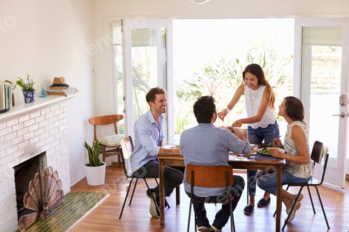 Preview: Group Of Friends Enjoying Dinner Party At Home Together