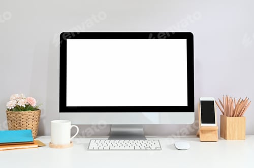 Preview: Workspace computer with a white blank screen is putting on a working desk.