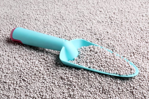 Preview: Metal trowel on chemical fertilizer. Gardening season
