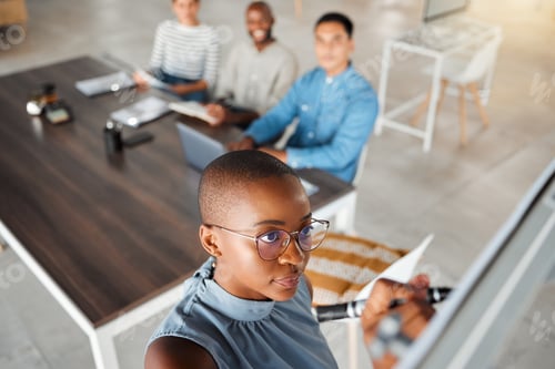 Preview: Group of diverse businesspeople having a meeting in an office at work. Young african american busin