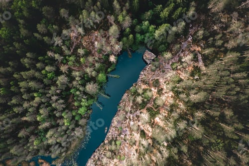 Preview: Bird's eye view of lake in Kolvananuuro in the middle of forest