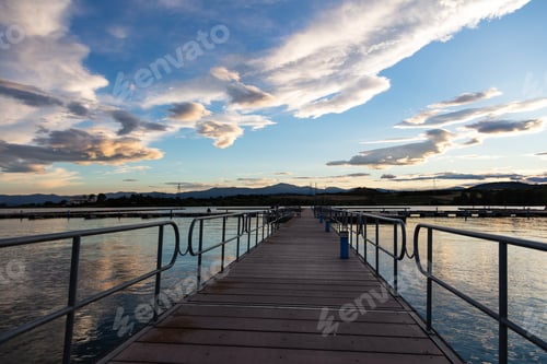 Preview: Sunrise sunset gazing from wooden pier over sea, copy space, wallpaper.