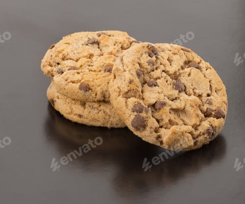 Preview: Fresh chocolate cookies isolated on black background