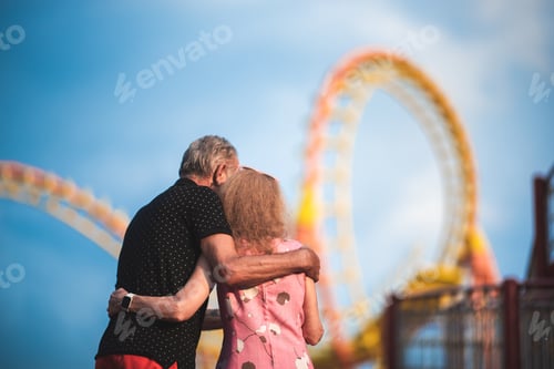 Preview: senior elderly grandparent, enjoy together have fun at amusement theme park