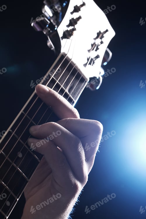 Preview: Musician playing on guitar