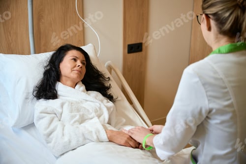 Preview: Young woman sits at the patients bedside
