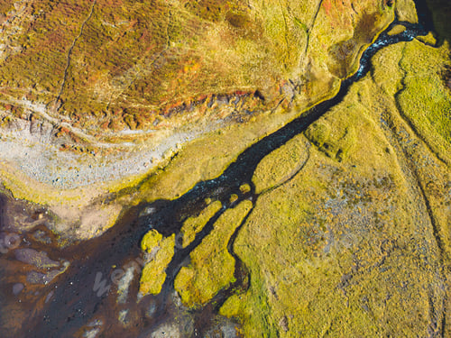 Preview: Aerial view of river running down into a small waterfall - Iceland, autumn 2022