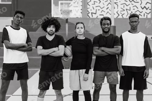 Preview: Group of multiracial people having fun playing basketball outdoor