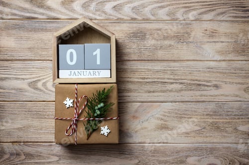 Preview: Calendar with date and gift boxes on color background. Christmas concept. toned