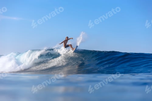 Preview: Indonesia, Sumatra, surfer on a wave