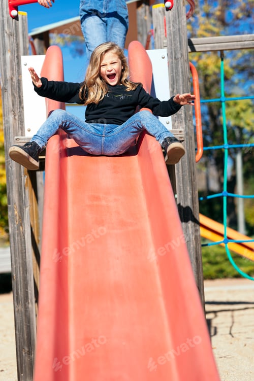 Preview: Little boy jumping on the slide ramp