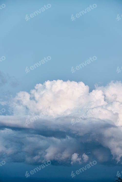Preview: Spectacular view of an airplane flying through a dramatic sky with a massive cloud formation