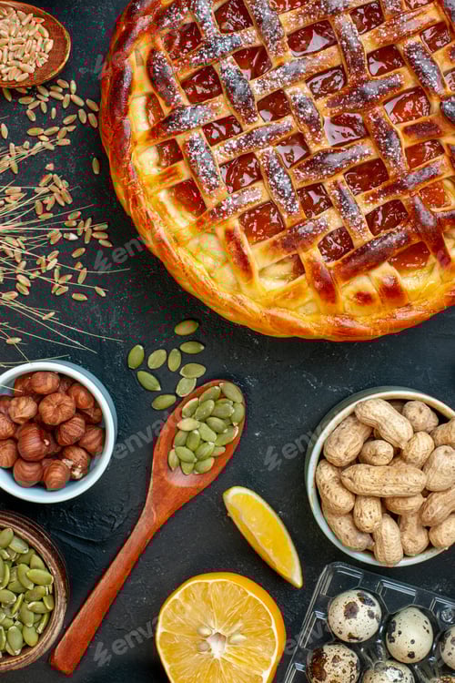 Preview: top view delicious fruity pie with eggs and flour on dark background biscuit cookie color pie cake