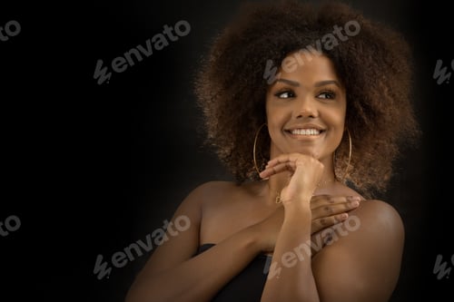 Preview: Dreamy tender black woman in studio