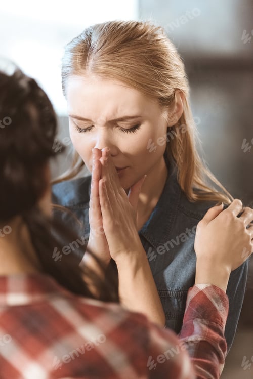 Preview: Young woman supporting her girlfriend in depression