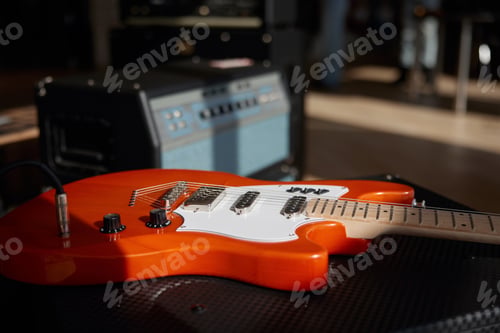 Preview: Guitar with a volume knob for sound adjustments close-up