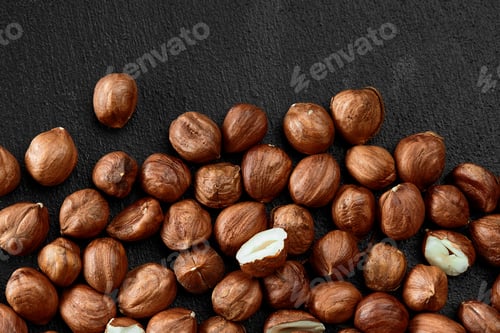 Preview: Close up of Hazelnut kernels - Food Frame Background, macro detailed close up.