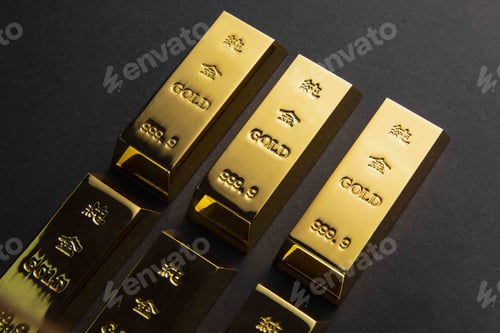 Preview: Closeup shot of gold bars on a black background