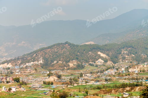 Preview: View of Kathmandu capital of Nepal from mountain through urban haze with lot of low rise buildings