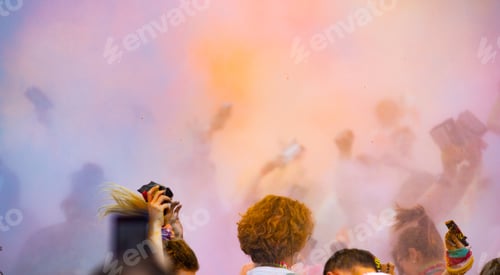 Preview: color festival in city crowd celebrating