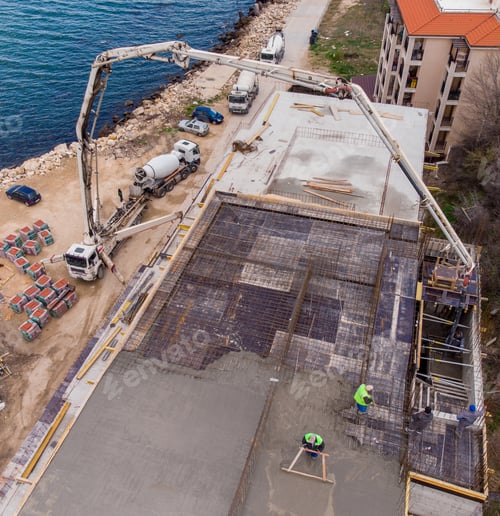 Preview: Pouring concrete cement on the roof using a concrete pump truck machine