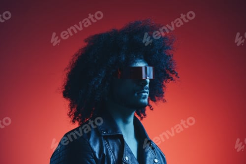 Preview: Portrait of fashion man with curly hair on red background with stylish glasses, multicultural