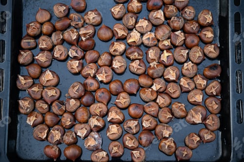 Preview: Chestnuts roasting on a tray