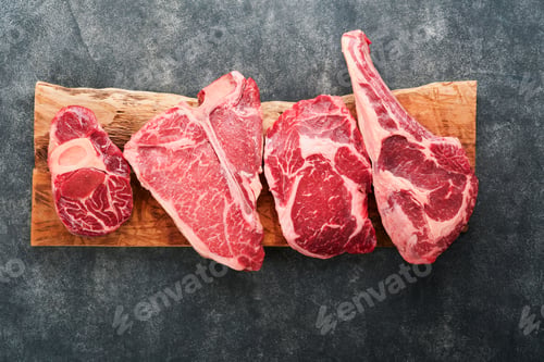 Preview: Raw prime steaks. Variety of fresh black angus prime meat steaks T-bone, New York, Ribeye, Striploin