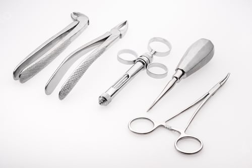 Preview: close-up view of professional dental instruments isolated on white