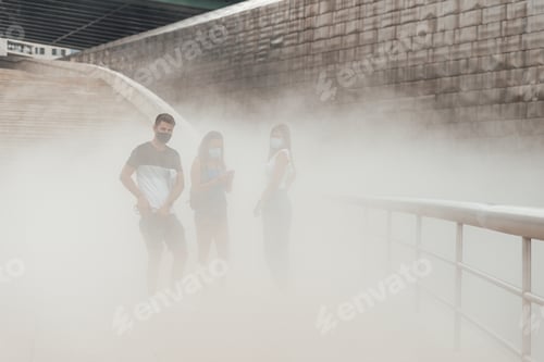 Preview: Three people with masks on a pollution cloud