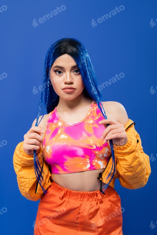 Preview: vibrant clothes, dyed hair, female model with blue hair posing