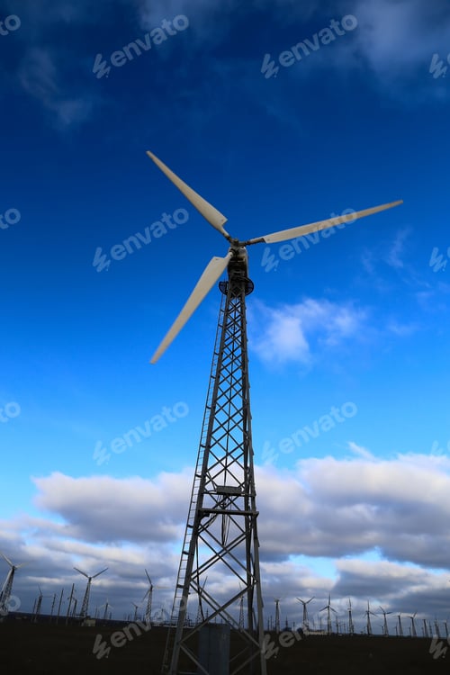 Preview: Wind mills during bright summer day
