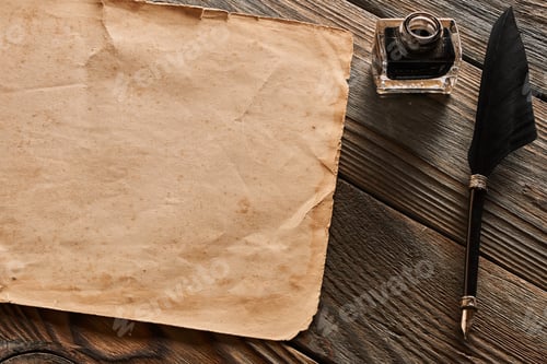 Preview: Feather pen and blank paper sheet