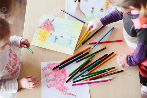 Preview: Little girls drawing a colorful pictures of elephant and playing children using pencil crayons