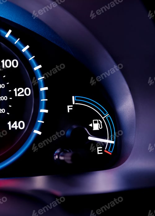 Preview: A car interior, the dashboard,instrument panel,and fuel gauge. A speedometer