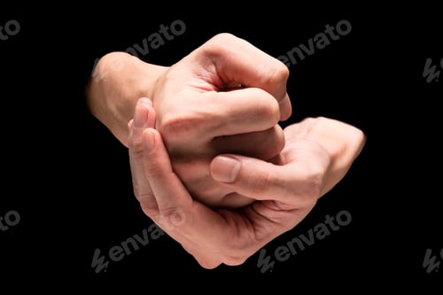 Preview: Male hands on a black background.