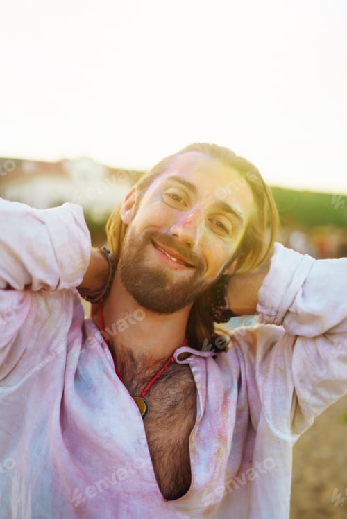 Preview: Young boys have a great time on Holi. Spring Break Beach Party. Traditional indian spring holiday.
