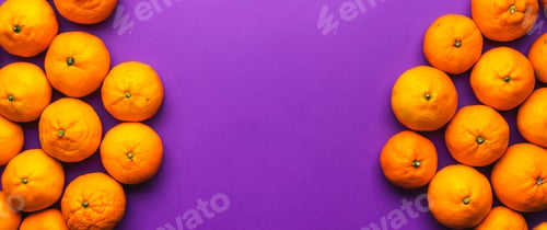Preview: Ripe bright orange tangerines on lilac background, fruit banner. Top view with copy space