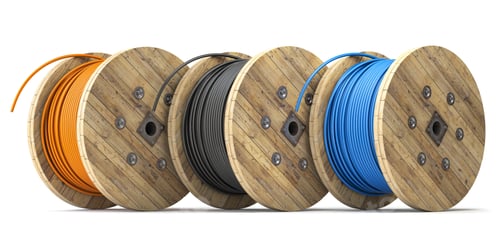 Preview: Wire electric cable of different colors on wooden coil or spool isolated on white background.