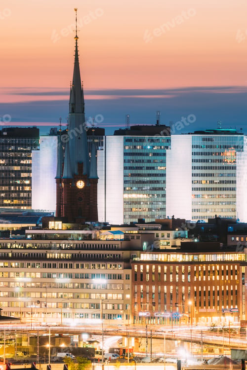 Preview: Stockholm, Sweden. Close View Of St. Clara Or Saint Klara Church And Houses In Twilight Dusk Lights