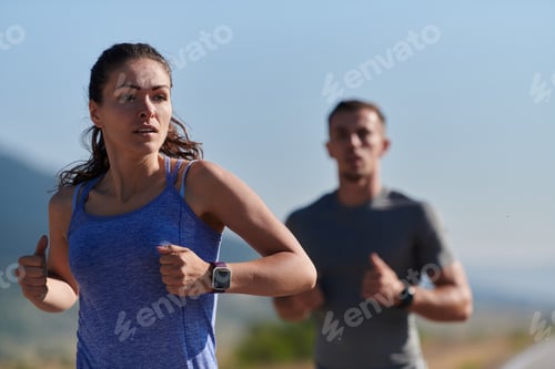 Preview: Energized by the beauty of nature, a couple powers through their morning run, their bodies and