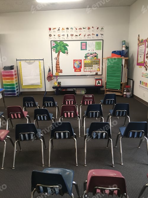 Preview: Empty Child size chairs in classroom
