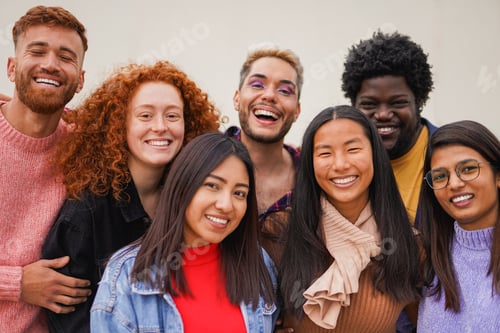 Preview: Group of happy multiracial friends smiling on camera outdoor