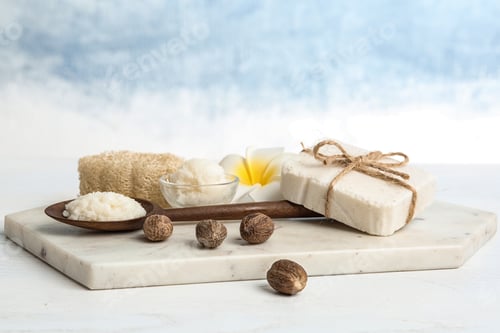 Preview: Composition with Shea butter and nuts on table against color background. Space for text